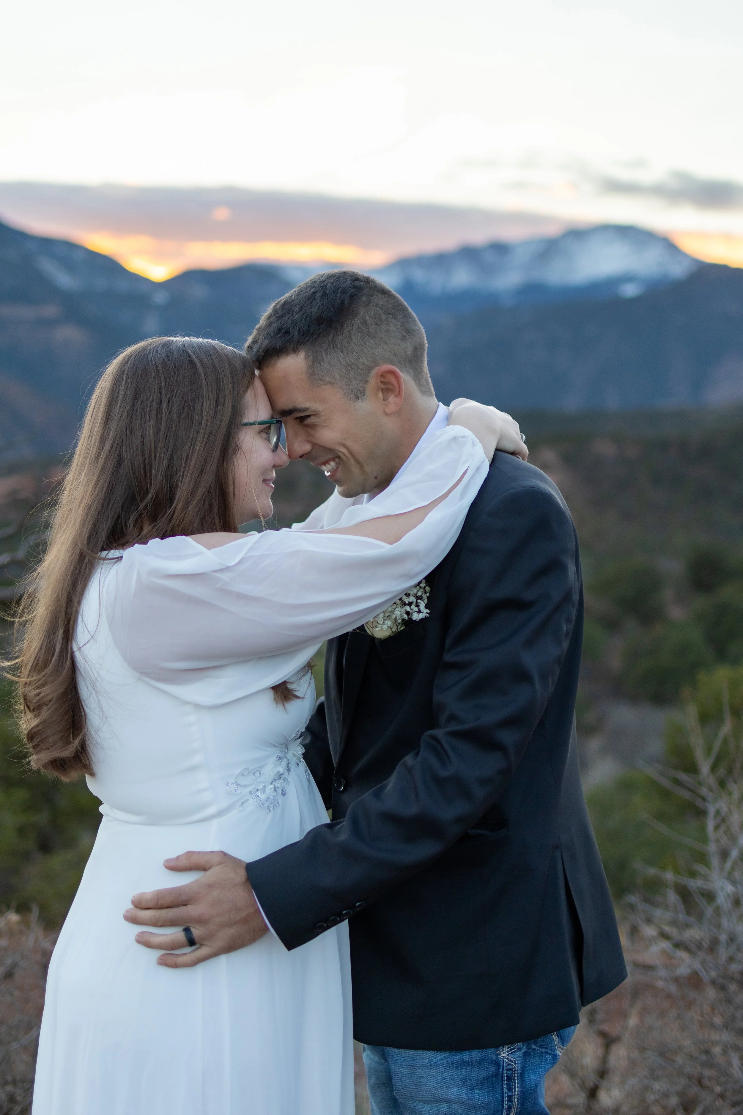 Couple photographed outdoors by Jillian Malec