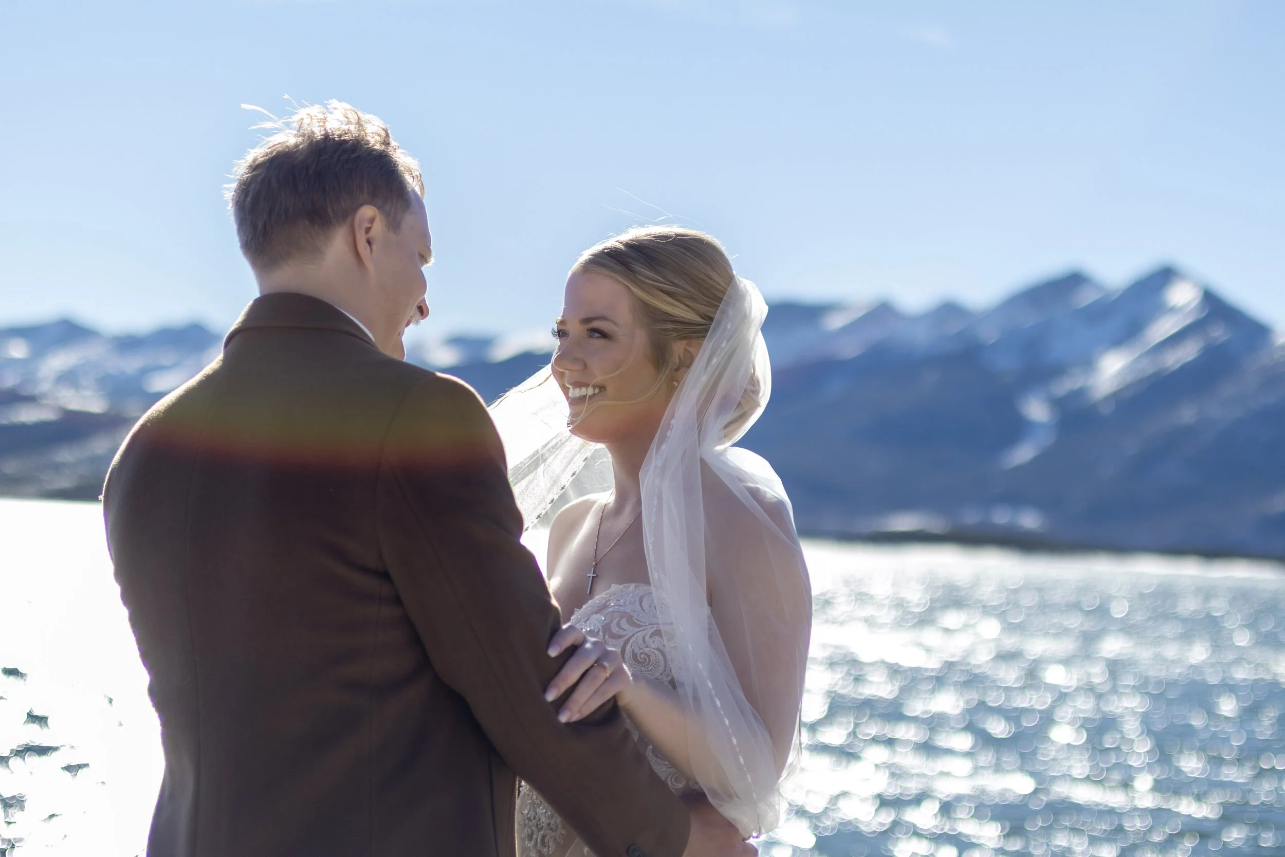 Wedding couple kissing in natural light